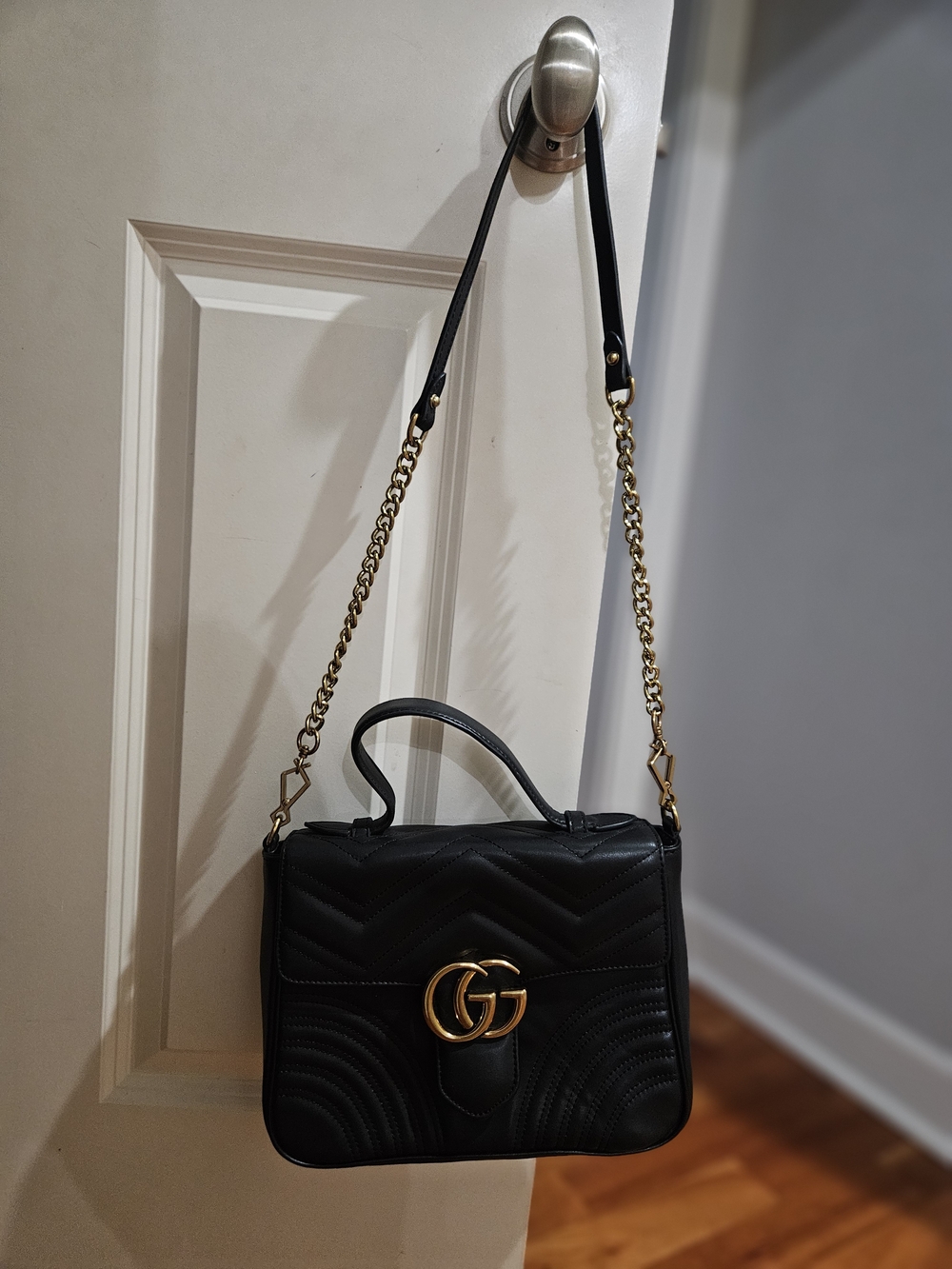 Black Quilted Leather Top-Handle Shoulder Bag with Gold Hardware